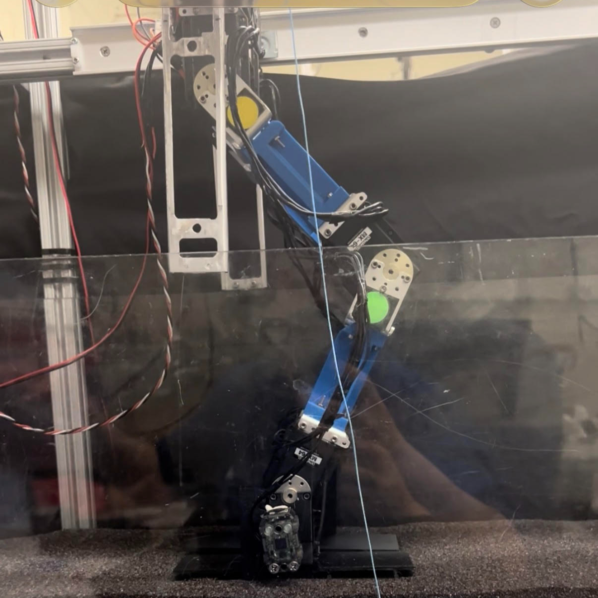 Biped robot's actuated cleat in the granular testbed